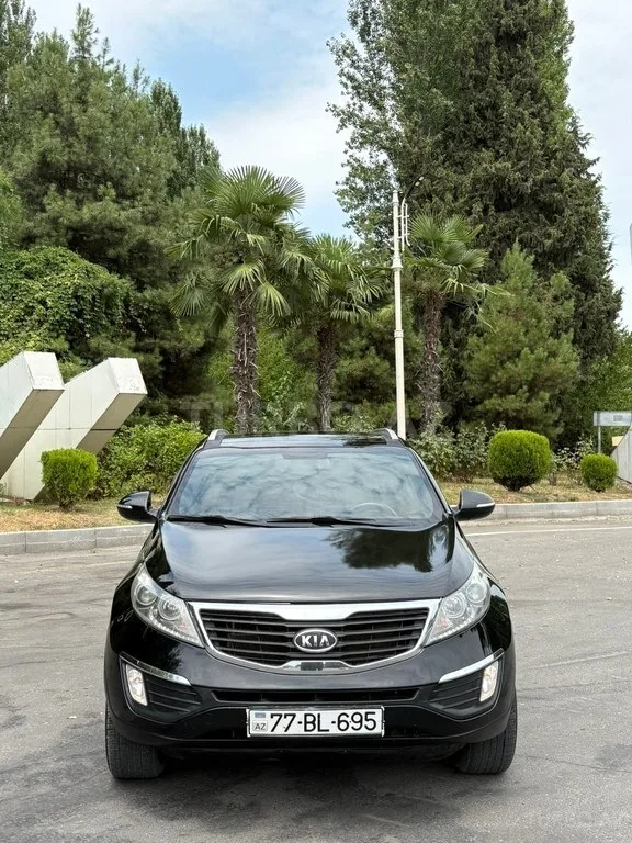 Kia Sportage — foto 1/4