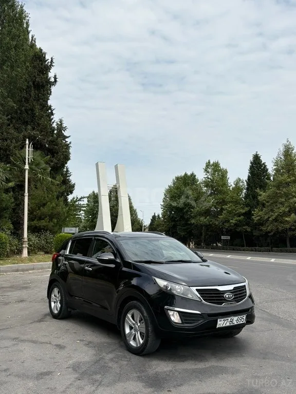 Kia Sportage — foto 2/4