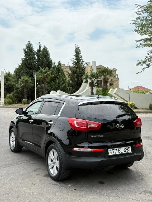 Kia Sportage — foto 4/4