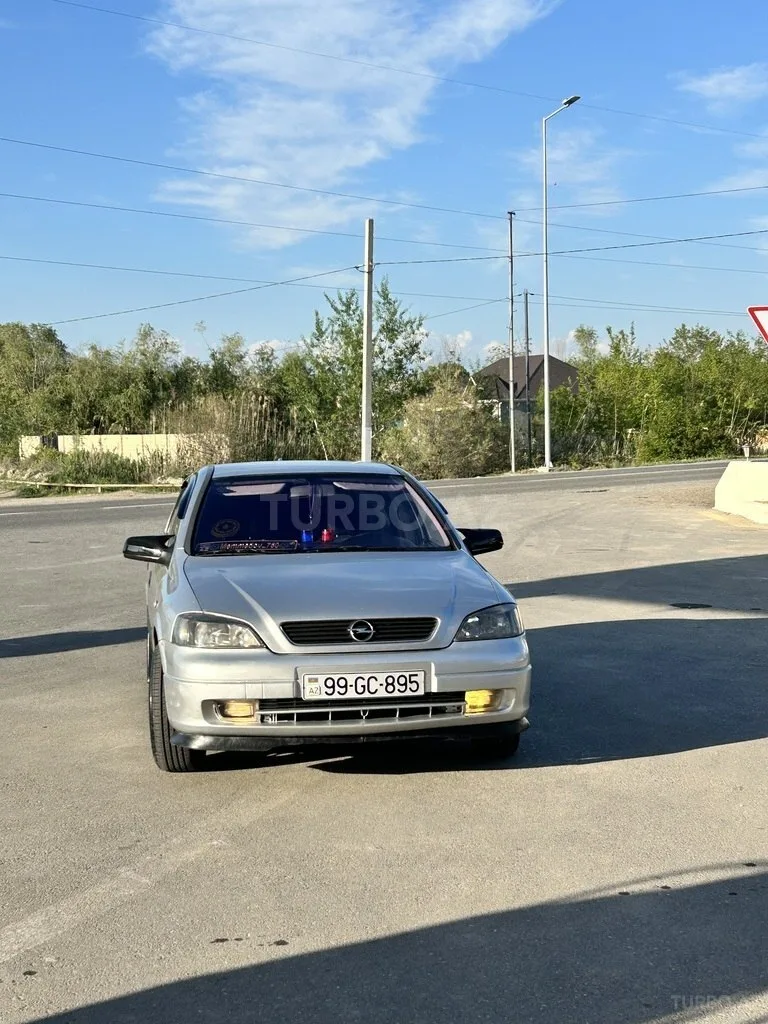 Opel Astra — foto 1/4