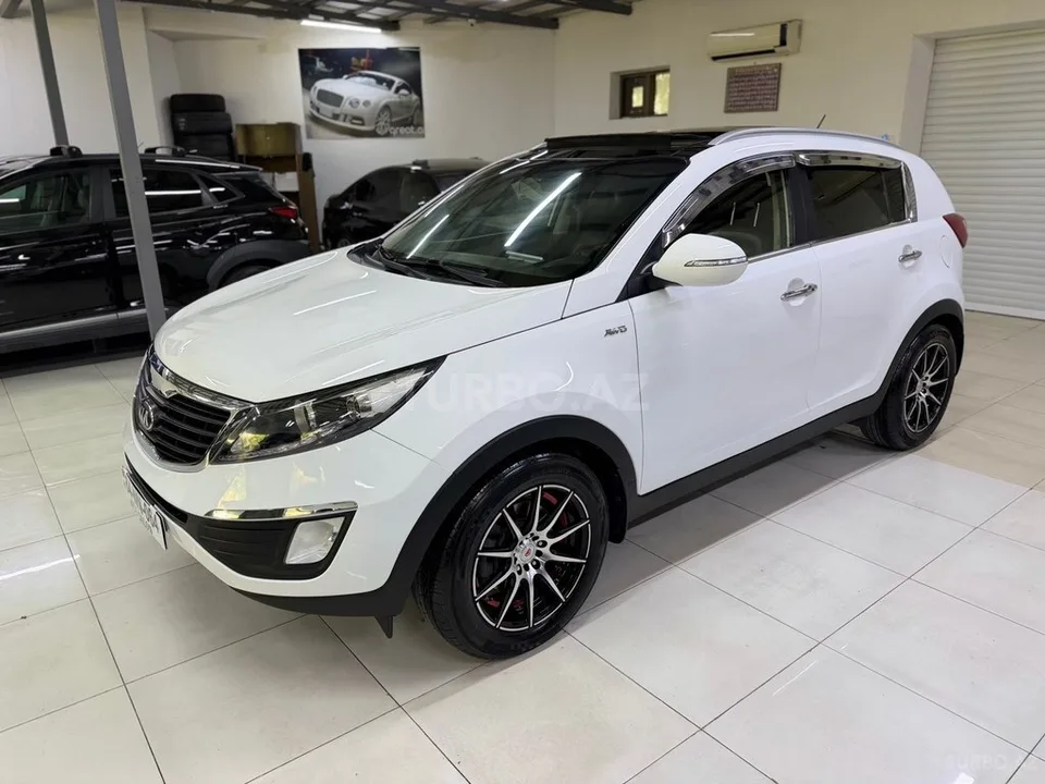 Kia Sportage — foto 4/4