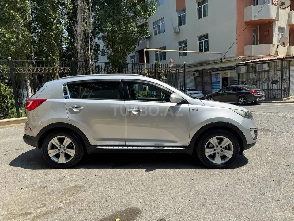 Kia Sportage — фото 4/4