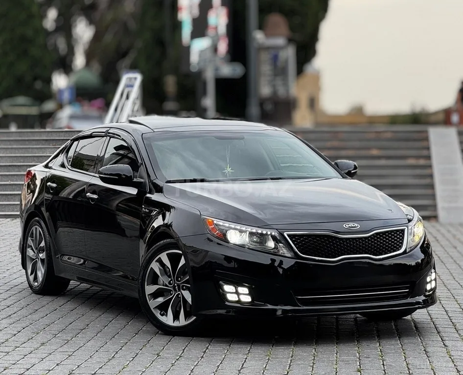 Kia Optima — foto 1/4