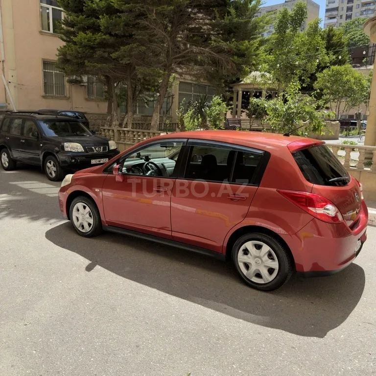 Nissan Tiida — foto 2/4