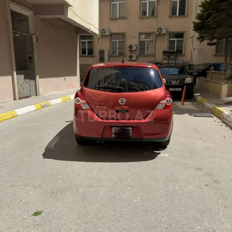 Nissan Tiida — foto 3/4