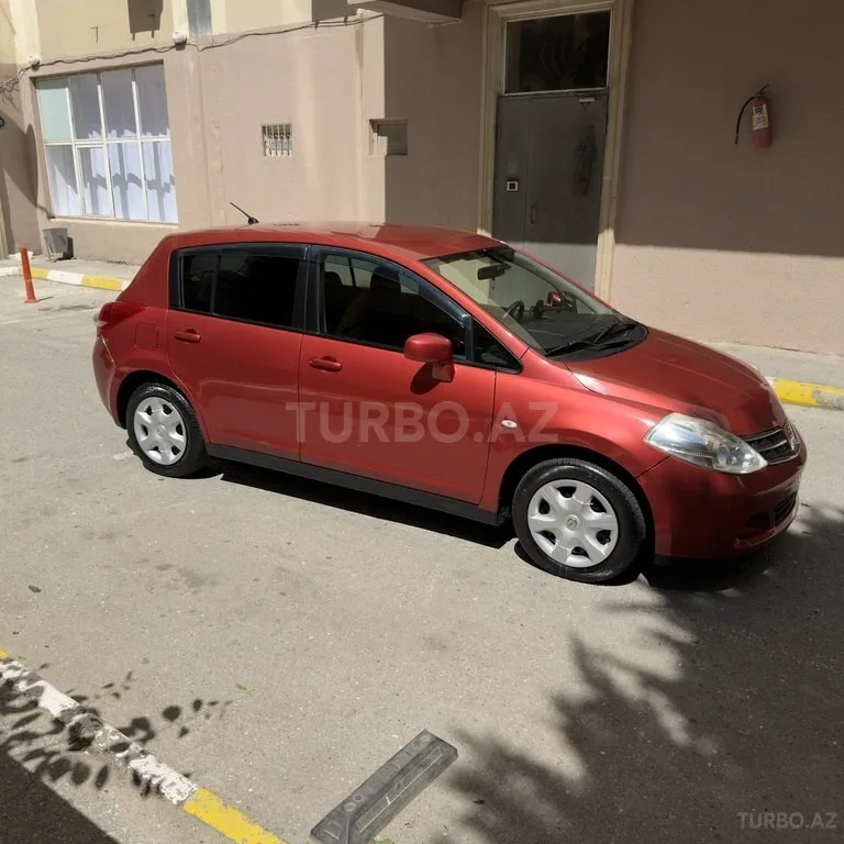 Nissan Tiida — foto 4/4