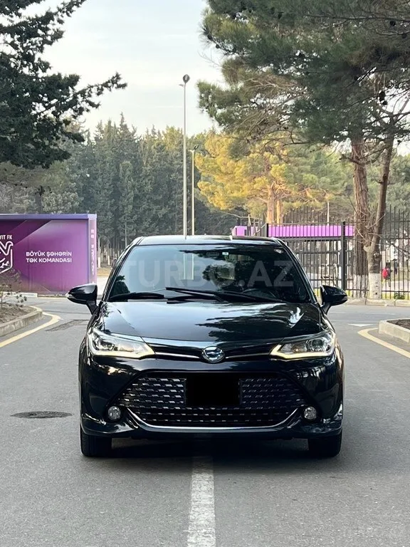 Toyota Corolla Fielder — foto 1/4