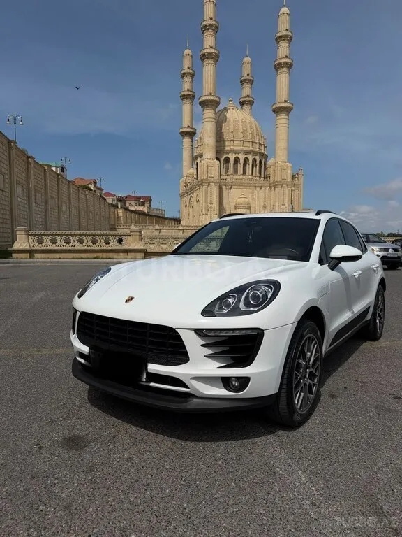 Porsche Macan — foto 1/4