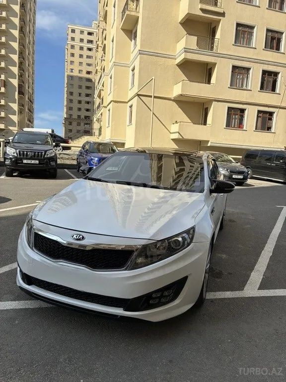 Kia Optima — foto 1/4
