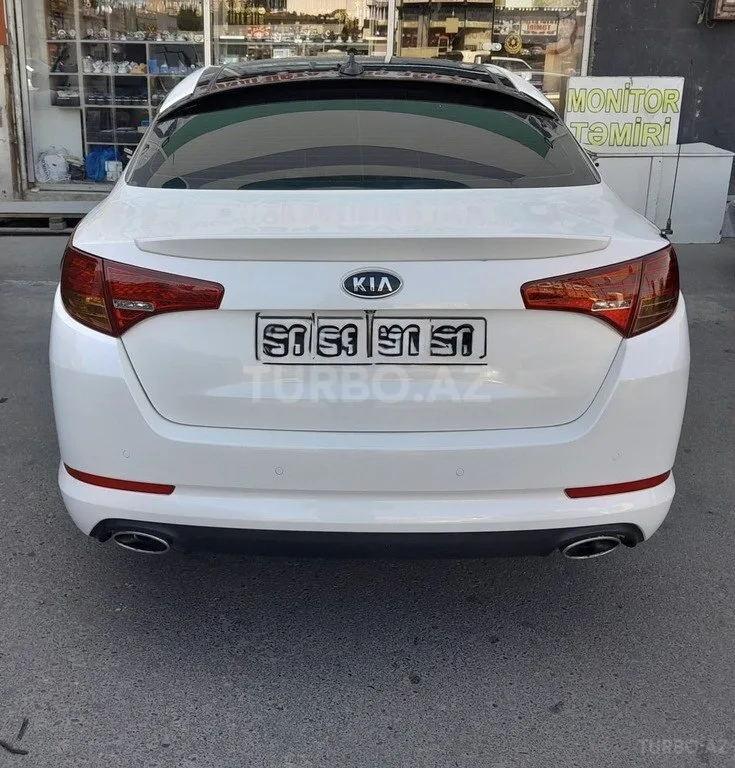 Kia Optima — foto 2/4