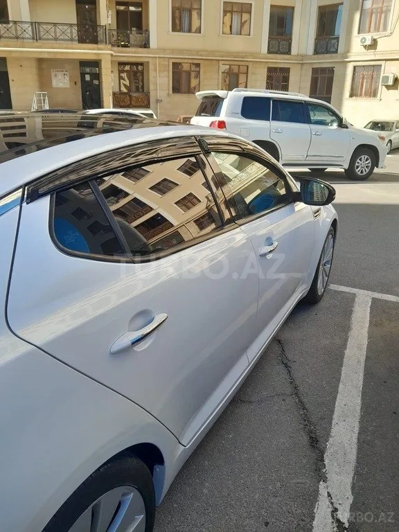 Kia Optima — foto 3/4