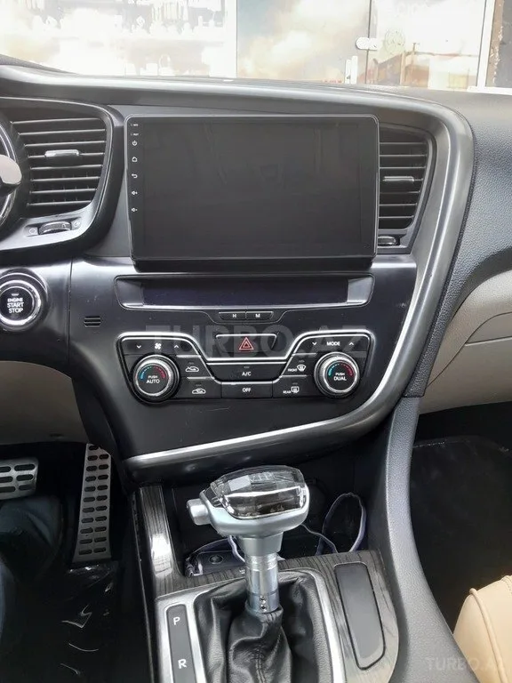 Kia Optima — foto 4/4