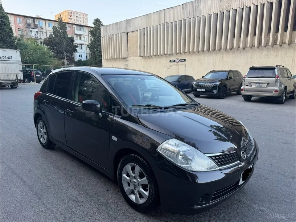 Nissan Tiida — фото 4/4