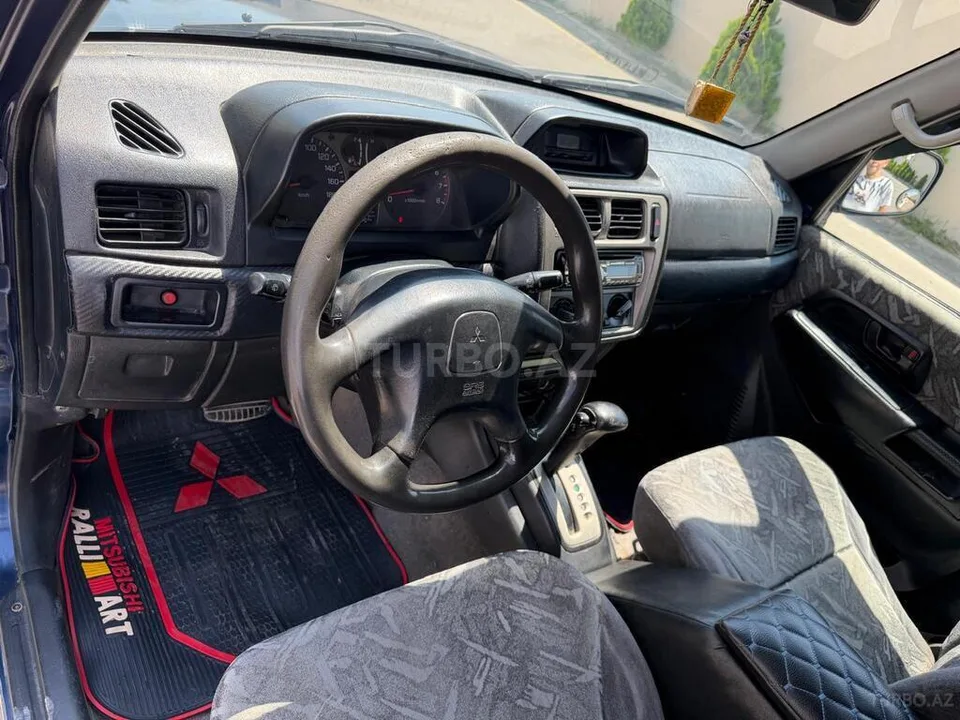 Mitsubishi Pajero io — foto 3/4