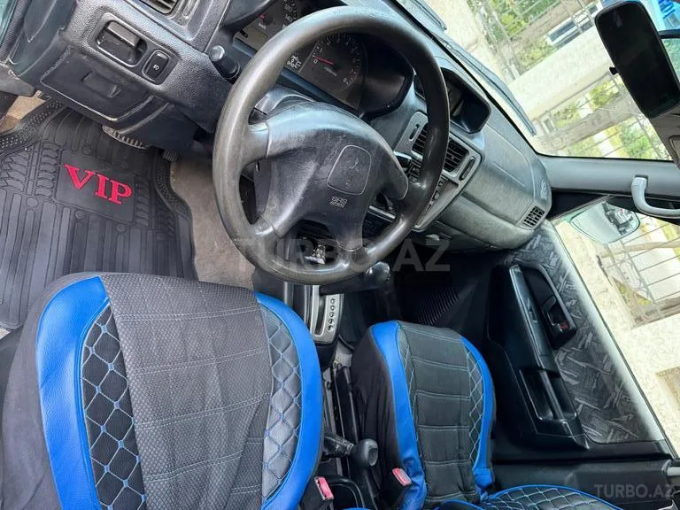 Mitsubishi Pajero io — foto 3/4