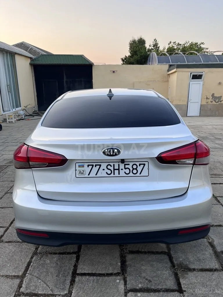 Kia Forte — foto 2/4