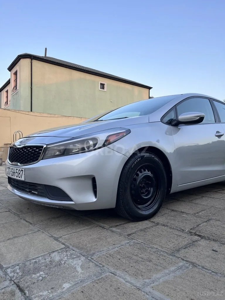Kia Forte — foto 4/4