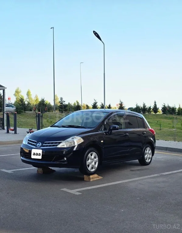 Nissan Tiida — foto 2/4