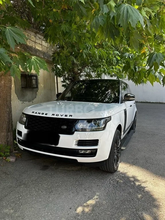 Land Rover Range Rover — фото 1/4