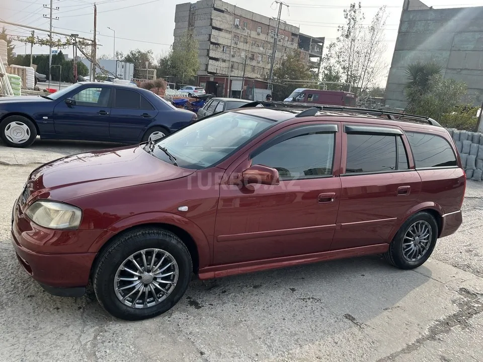 Opel Astra — фото 2/4