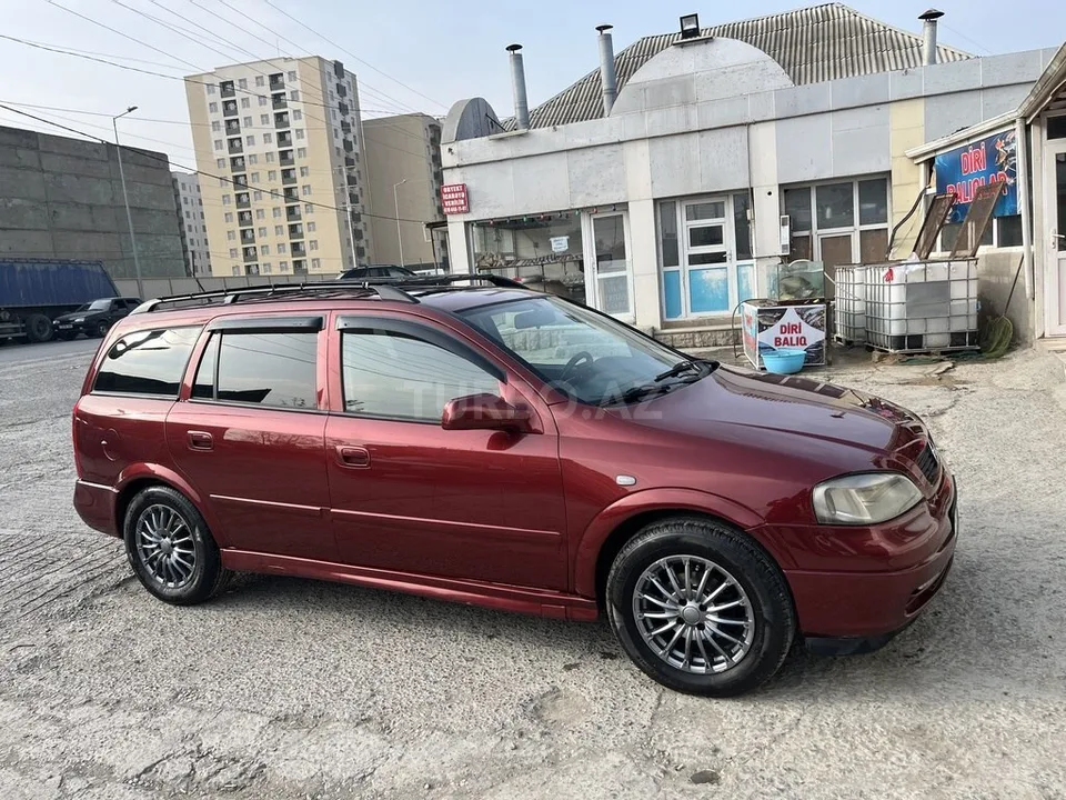 Opel Astra — фото 3/4