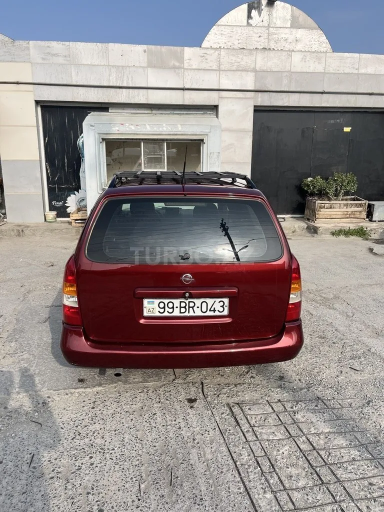 Opel Astra — фото 4/4