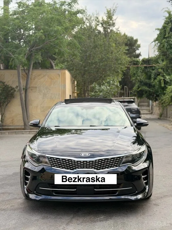 Kia Optima — foto 1/4