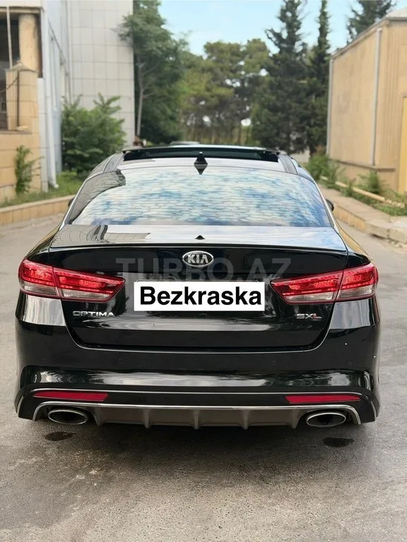 Kia Optima — foto 2/4