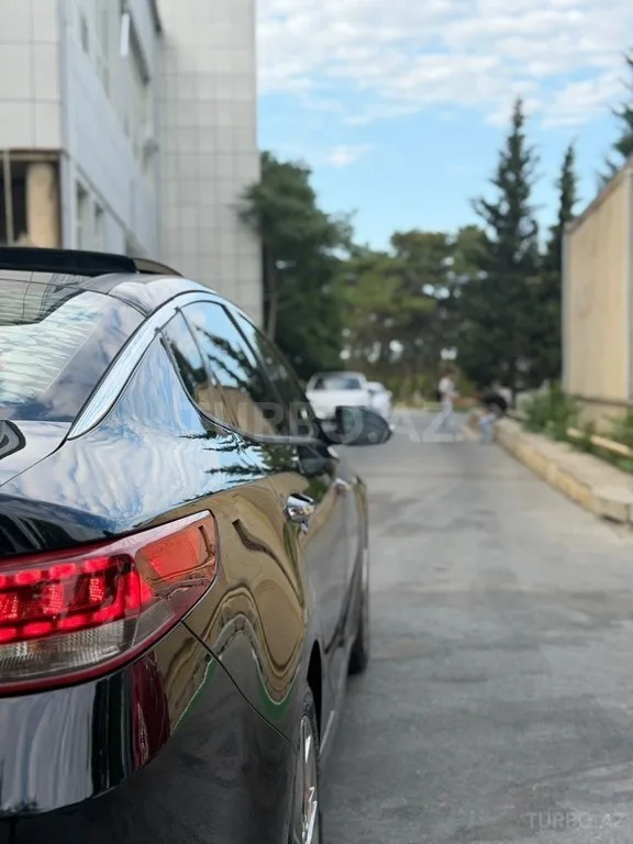 Kia Optima — foto 4/4