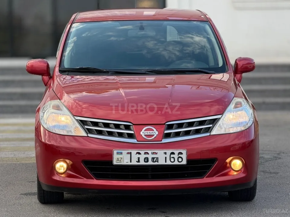 Nissan Tiida — foto 3/4