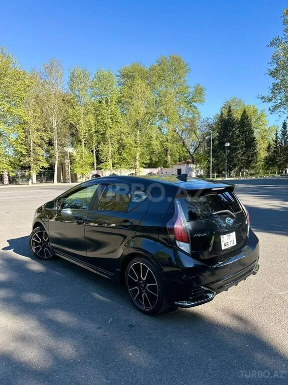 Toyota Aqua — foto 3/4