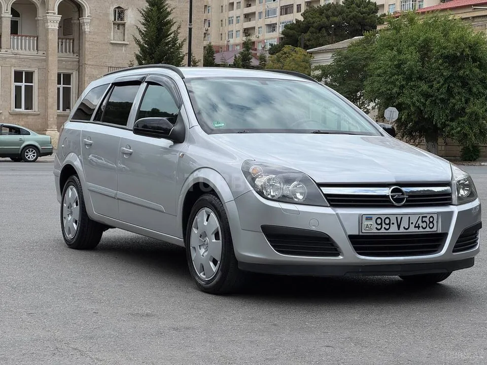 Opel Astra — фото 3/4