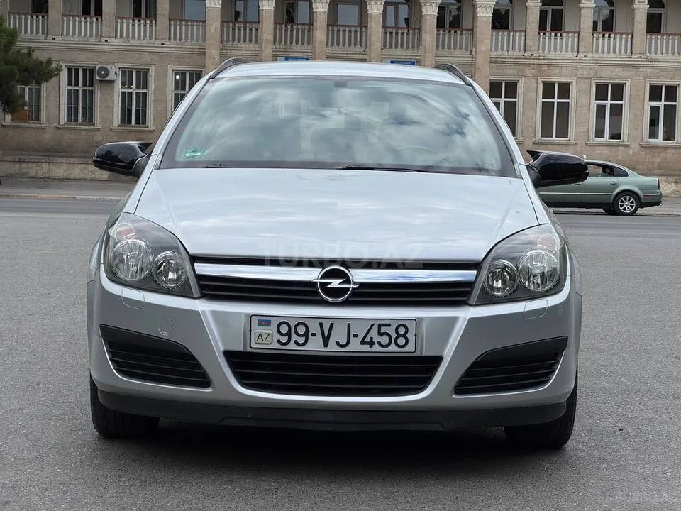 Opel Astra — фото 4/4