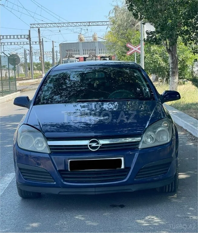 Opel Astra — фото 1/4