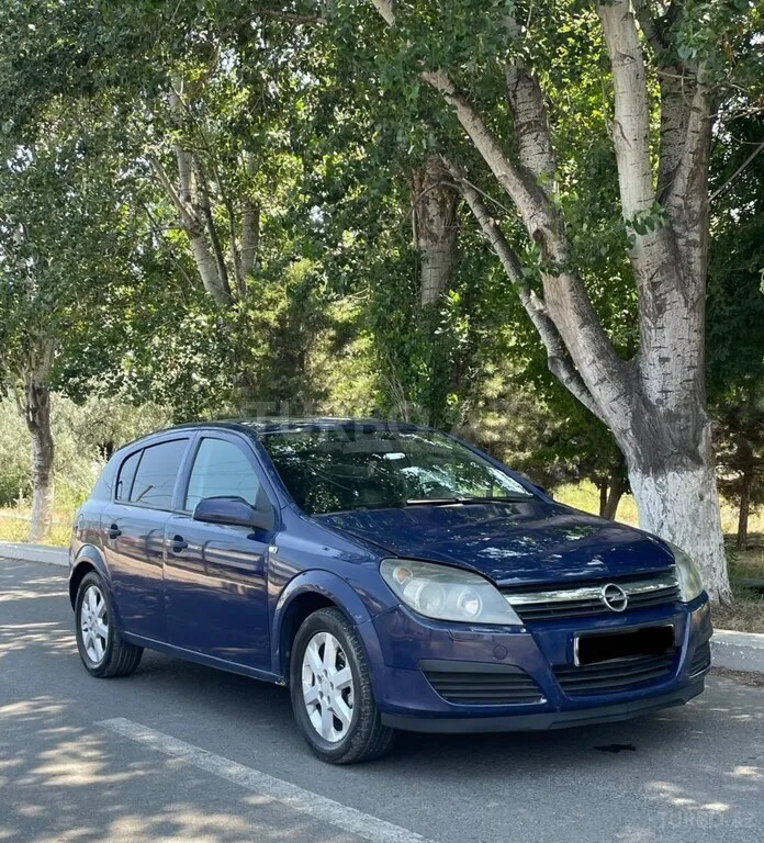 Opel Astra — фото 3/4
