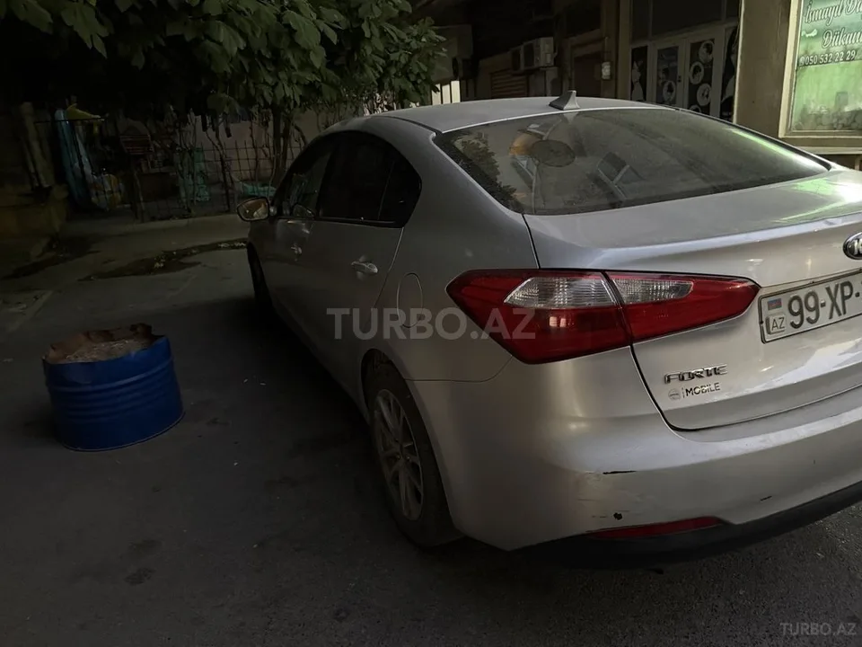 Kia Forte — foto 4/4