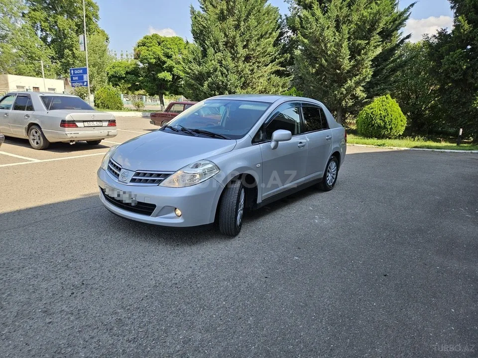Nissan Tiida — foto 2/4