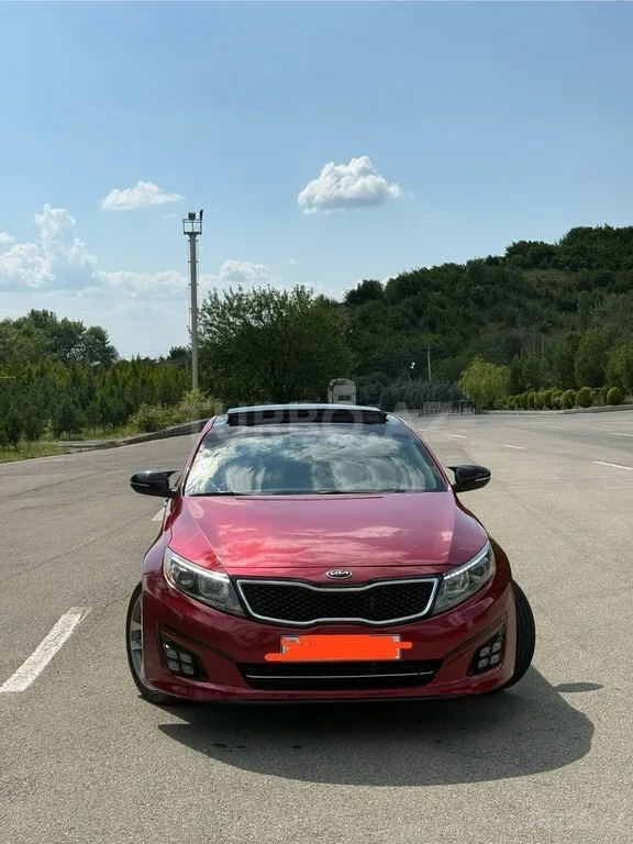 Kia Optima — фото 1/4