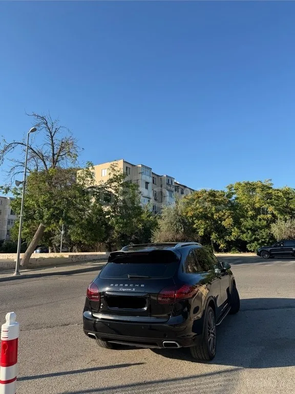 Porsche Cayenne — foto 4/4