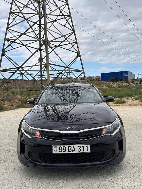 Kia Optima — foto 1/4
