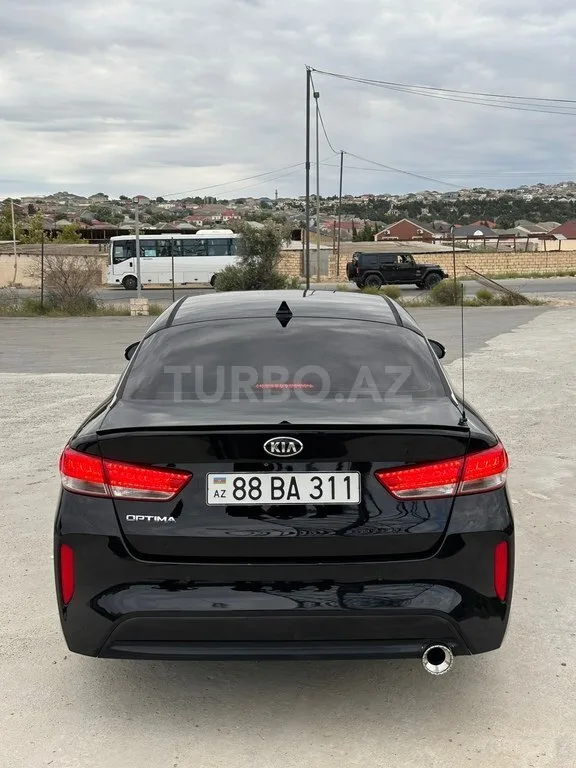 Kia Optima — foto 2/4