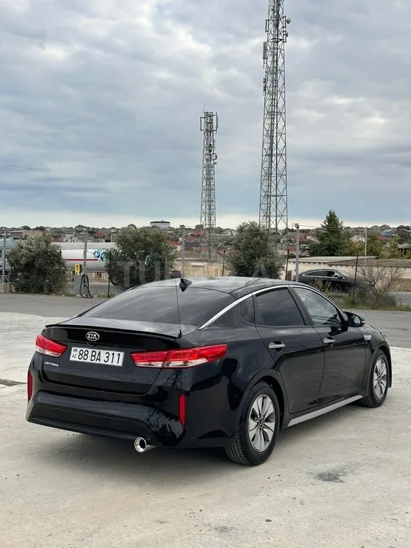 Kia Optima — foto 4/4