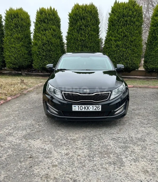 Kia Optima — foto 1/4