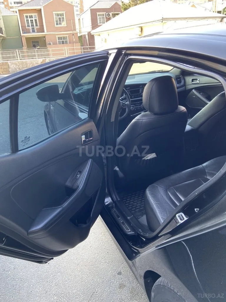 Kia Optima — foto 2/4