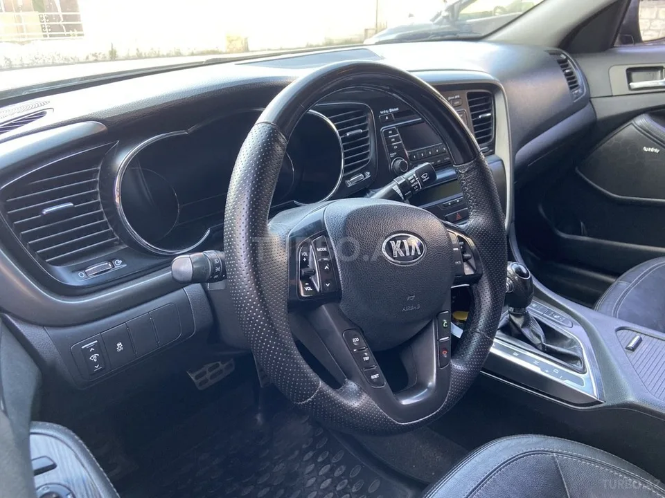 Kia Optima — foto 4/4