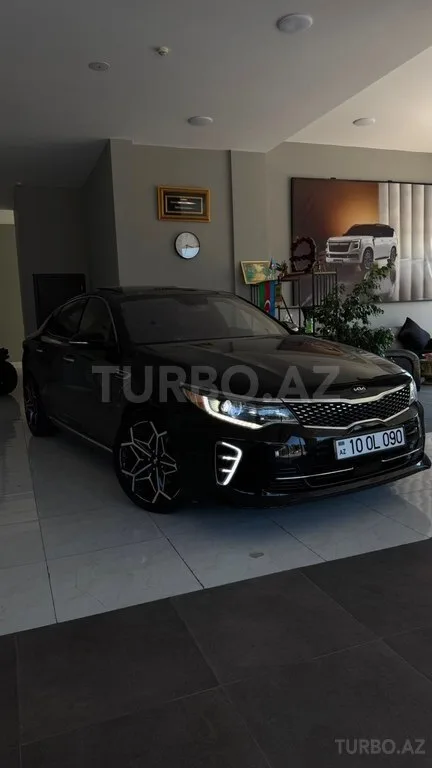 Kia Optima — foto 1/4