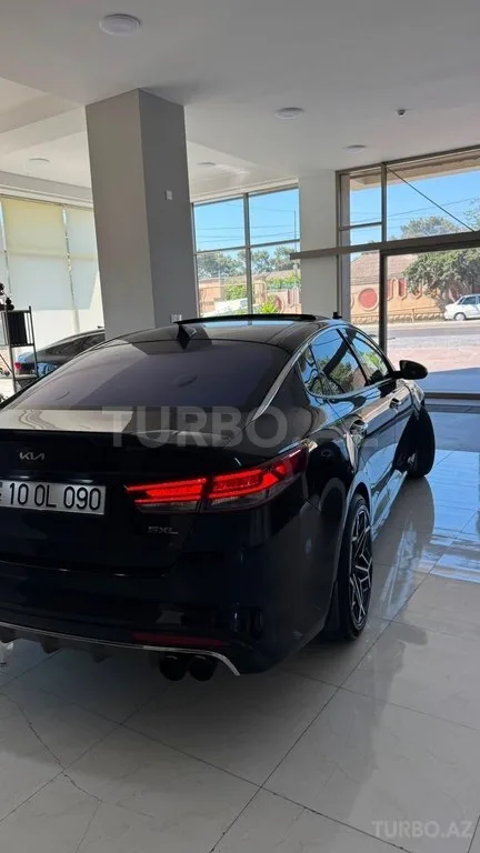 Kia Optima — foto 4/4