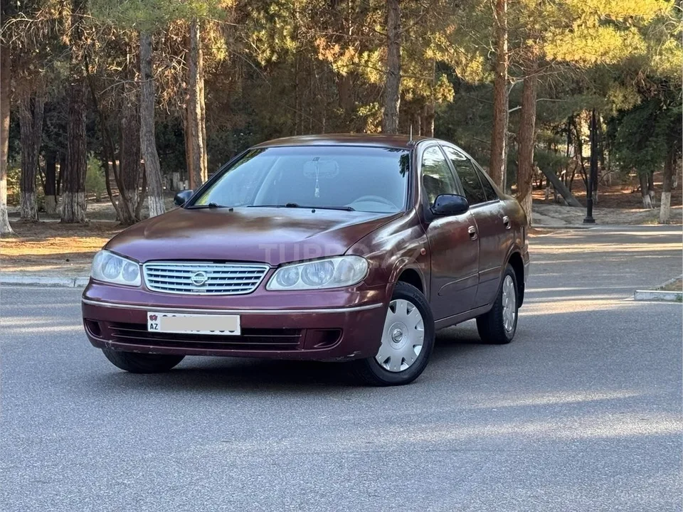 Nissan Sunny — foto 1/4