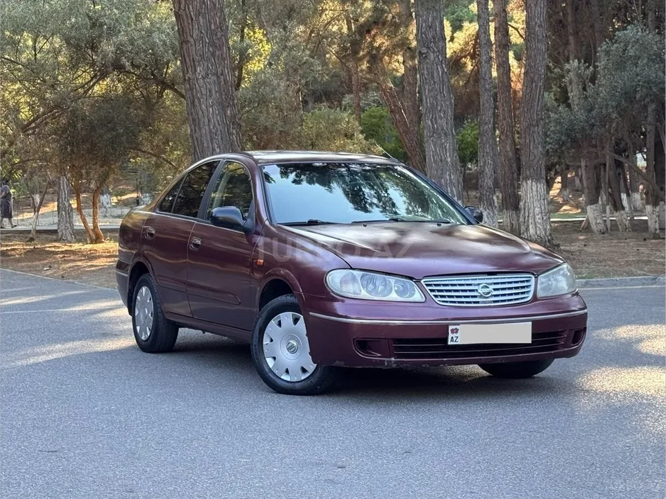Nissan Sunny — foto 3/4