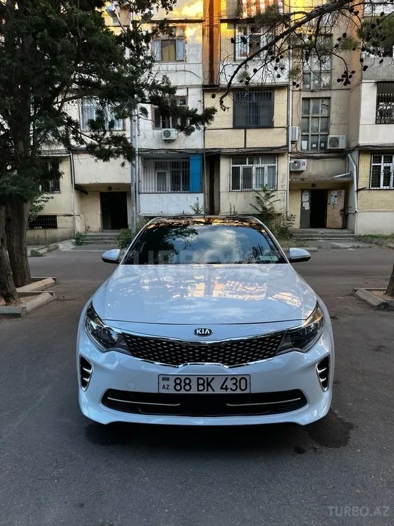 Kia Optima — foto 1/4